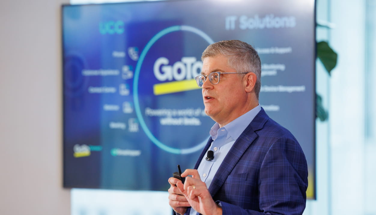 GoTo CEO Rich Veldran presenting GoTo's capabilities and vision across IT solutions and business communications.