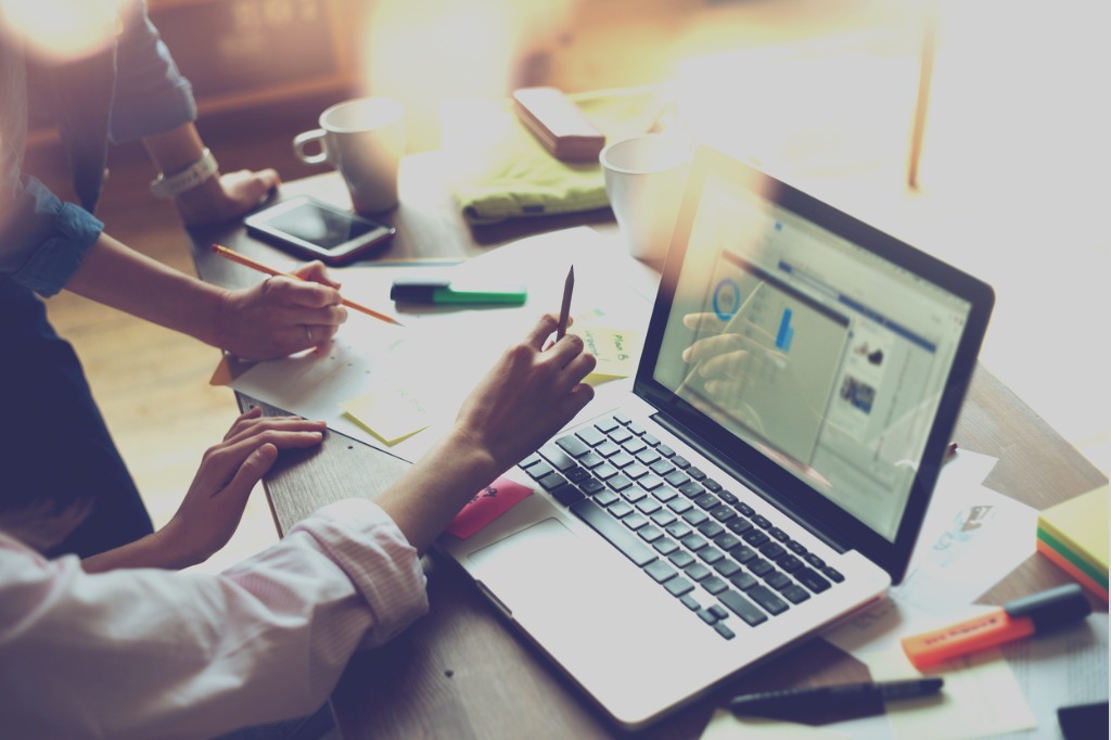 marketing-team-discussing-new-working-plan-picture-id621142710