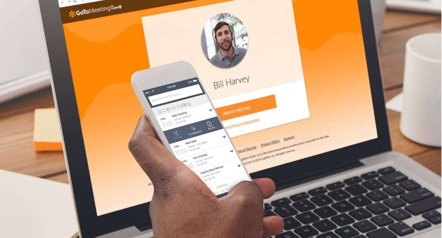 A person using GoTo meeting’s secure software through their laptops or mobile devices.