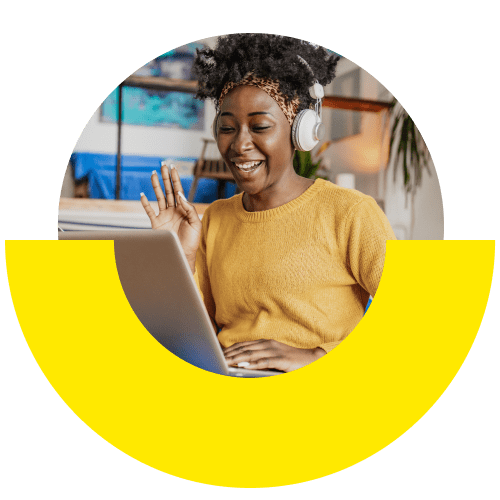 Person at home using business collaboration tools on laptop.